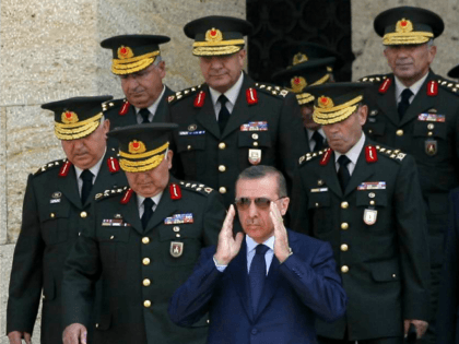 Turkey's Prime Minister Tayyip Erdogan (C) is flanked by Ground Forces Commander and acting Chief of Staff General Necdet Ozel (L) during a wreath-laying ceremony at the mausoleum of Mustafa Kemal Ataturk, founder of modern Turkey, in Ankara on August 1, 2011 AFP PHOTO/STR (Photo credit should read -/AFP/Getty Images)