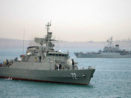 In this picture taken on Tuesday, April 7, 2015, and released by the semi-official Fars News Agency, Iranian warship Alborz, foreground, prepares before leaving Iran's waters. Iran dispatched a naval destroyer and another logistic vessel, Wednesday to waters near Yemen as the United States quickened weapons supply to the Saudi-led …