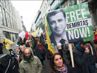 kurdish-protester-against-Selahattin-Demirtas-arrest-getty BRUSSELS, BELGIUM - 2016/11/17: A Kurdish protester holds up a banner for Demirtas at a Kurdish march in Brussels against Turkeys policy. (Photo by Frederik Sadones/Pacific Press/LightRocket via Getty Images)