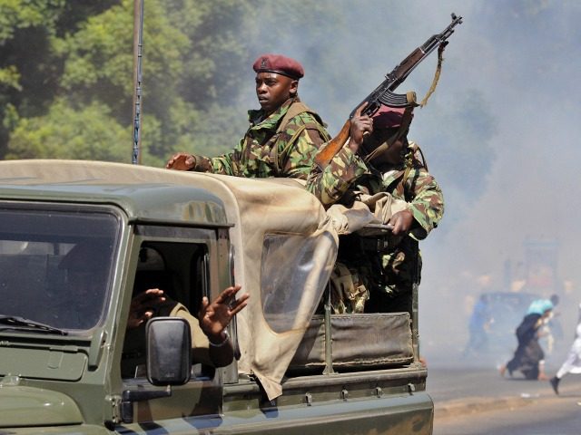 Kenyan policemen disperse demonstrating Muslims in Nairobi on January 9, 2009 as they atte