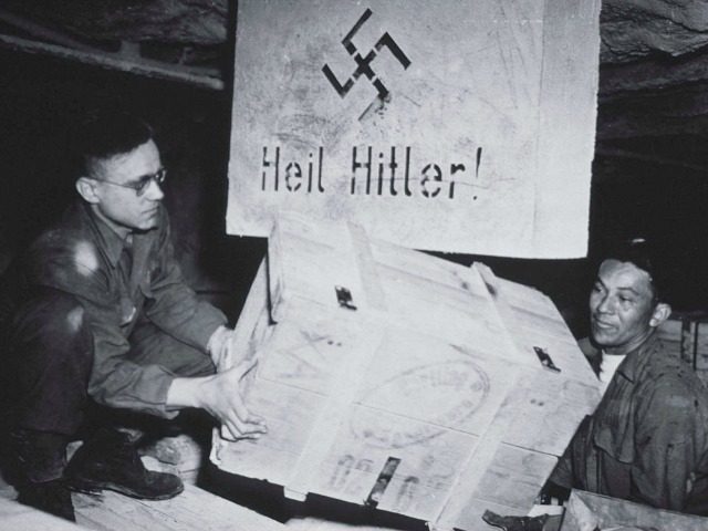 US soldiers unload acrates of art taken from jews by the Nazi's and stored in the Heilbron