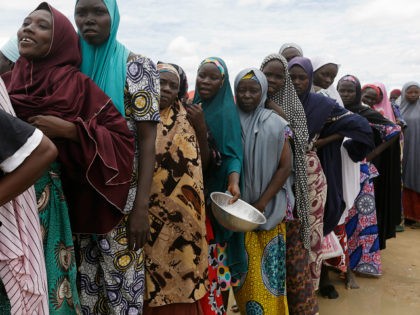 FILE-In this file photo taken Saturday, Aug. 27, 2016, women displaced by Islamist extremi