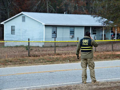 Georgia Bureau of Investigation Special Agent in Charge J.T. Ricketson works at a scene of