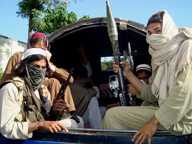 FILE - In this April 24, 2009 picture, Pakistani Taliban leave Buner, Pakistan. Coordinated attacks - along with threats to women, shops selling CDs and barbers - suggest that the Taliban are bleeding out of their traditional havens in the Northwest Frontier Province into Pakistan's Punjab heartland, home to more …