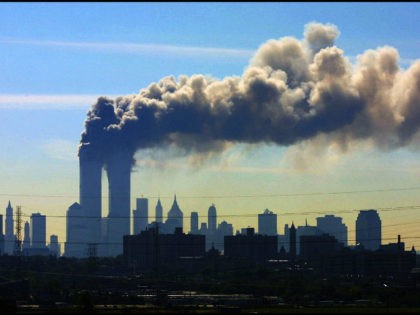 FILE - In this Sept. 11, 2001 file photo, as seen from the New Jersey Turnpike near Kearny