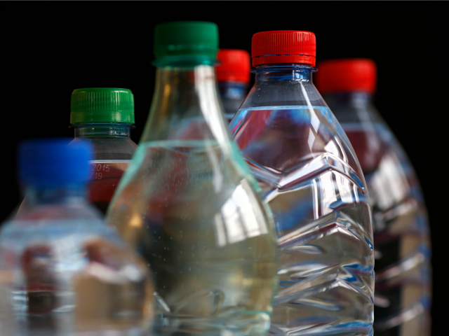Picture of bottles of mineral water taken on March 24, 2013 in Paris. Traces of drugs and