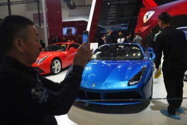 China's new tax on luxury cars will likely hit brands such as Ferrari, Rolls-Royce, and La