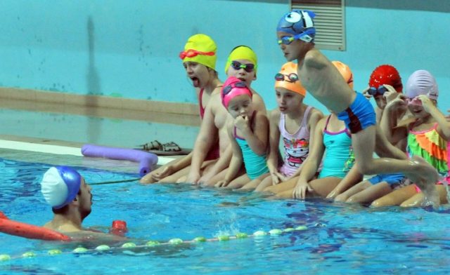 Amel Kapo teaches Bosnian children with disabilities to swim in Sarajevo's Olympic swimmin