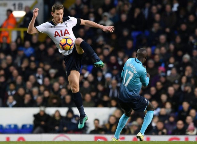 Tottenham Hotspur's Jan Vertonghen kicks the ball past Swansea City's Modou Barrow during