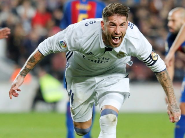 Real Madrid's defender Sergio Ramos celebrates after scoring a goal during the Spanish lea