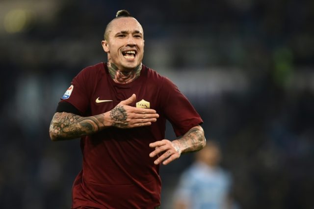 Roma's Radja Nainggolan celebrates after scoring during the Serie A match against Lazio at