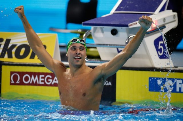 Chad Le Clos of South Africa celebrates after winning the 200m butterfly final on day one