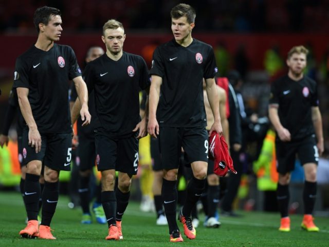 Zorya Luhansk players leave the pitch following their UEFA Europa League Group A match aga