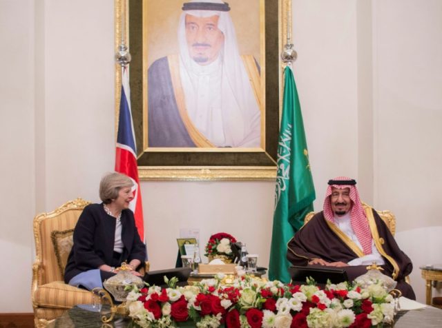 Saudi King Salman meets with British Prime Minister Theresa May during a Gulf Cooperation