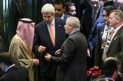 US Secretary of State John Kerry (C) speaks to Saudi Arabia's Foreign Minister Adel al-Jub