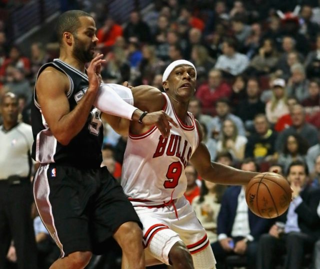 Rajon Rondo of the Chicago Bulls moves against Tony Parker of the San Antonio Spurs at the