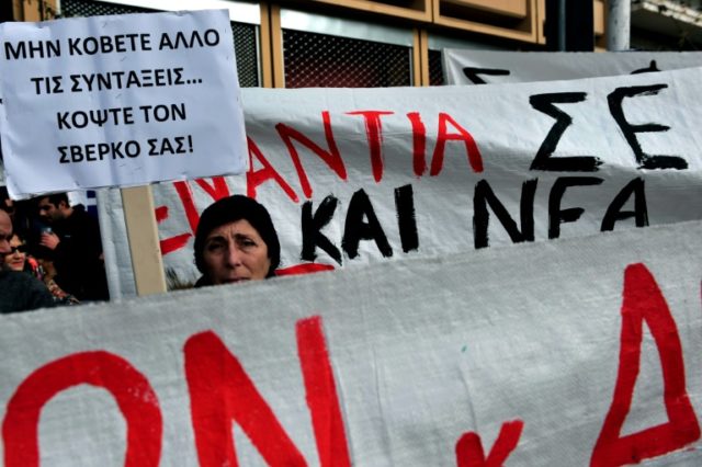 Greeks protest against planned new pay cuts and taxes called for by international creditor