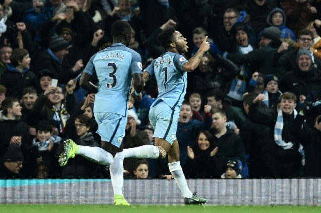 Manchester City's midfielder Raheem Sterling (R) celebrates scoring on December 18, 2016