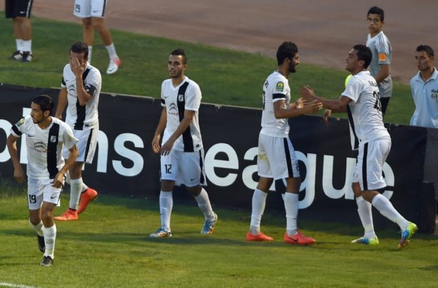 Tunisia's CS Sfaxien players celebrate after scoring a goal during a CAF Champions League