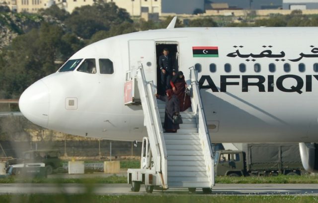 A group of hostages is released from a hijacked Afriqiyah Airways plane in Malta on Decemb