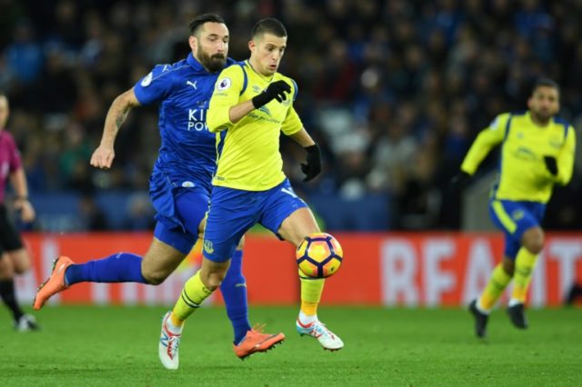 Everton striker Kevin Mirallas runs through the Leicester defence on the way to scoring th