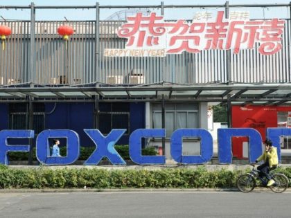 Foxconn, a major Apple supplier, will spend the vast sum on an industrial complex in the sprawling southern Chinese city of Guangzhou, state media says