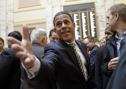 FILE - In this Jan. 14, 2015 file photo, Outgoing Maryland Lt. Gov. Anthony Brown greets members of the House of Delegates in Annapolis, Md., the first day of the 2015 legislative session. Eighteen months after he surprisingly lost his bid for the state's highest office, a safely Democratic seat …