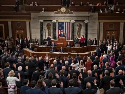 Speaker of the House Paul Ryan, R-Wis., administers the oath to the members of the House of Representatives as the 115th Congress convenes at the Capitol in Washington, Tuesday, Jan. 3, 2017. With the GOP now in control of the White House, the Senate, and the House, Republicans are expected …