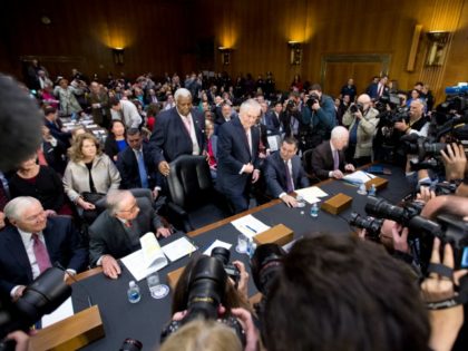 Secretary of State-designate Rex Tillerson, center, accompanied by, from left, former Defe