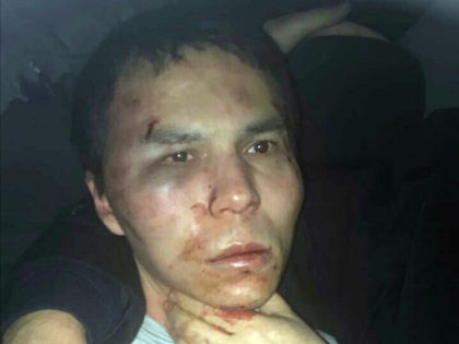 Reina club attacker after being caught by Turkish police in Istanbul, late Monday, Jan. 16