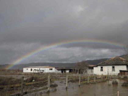 California rain drought rainbow flood (Marcio Jose Sanchez / Associated Press)
