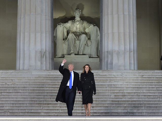 US President-elect Donald Trump and his wife Melania arrive to attend an inauguration concert at the Lincoln Memorial in Washington, DC, on January 19, 2017. / AFP / MANDEL NGAN (Photo credit should read MANDEL NGAN/AFP/Getty Images) 