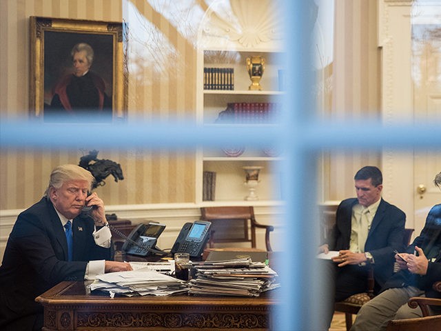Donald-Trump-Window-Oval-Office-DC-Jan-2017-Getty