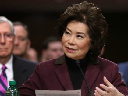 Elaine Chao testifies during her confirmation hearing to be the next U.S. secretary of transportation before the Senate Commerce, Science and Transportation Committee as her husband, Senate Majority Leader Mitch McConnell (R-KY) (L) looks on, in the Dirksen Senate Office Building on Capitol Hill January 11, 2017 in Washington, DC. …