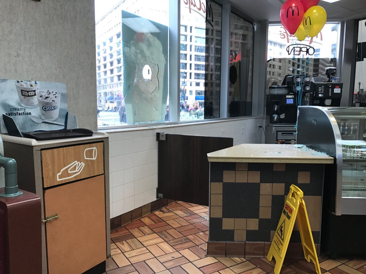 Employees crying inside this McDonald's, where leftist anarchist smashed the window.