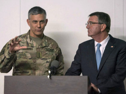 In this photo provided by the Defense Department, taken Oct. 23, 2016, Defense Secretary Ash Carter listens as U.S. Army Lt. Gen. Stephen Townsend, commander of Combined Joint Task Force-Operation Inherent Resolve, speaks during a news conference in Erbil, Iraq. Townsend, the commander of the U.S.-led coalition against the Islamic …