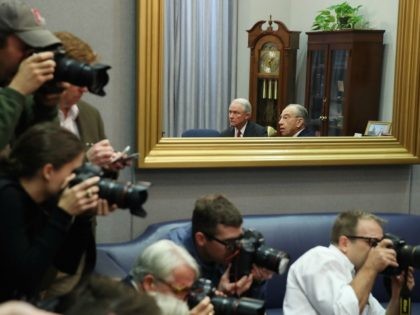 WASHINGTON, DC - NOVEMBER 29: Members of the media gather to photograph U.S. Attorney Gene