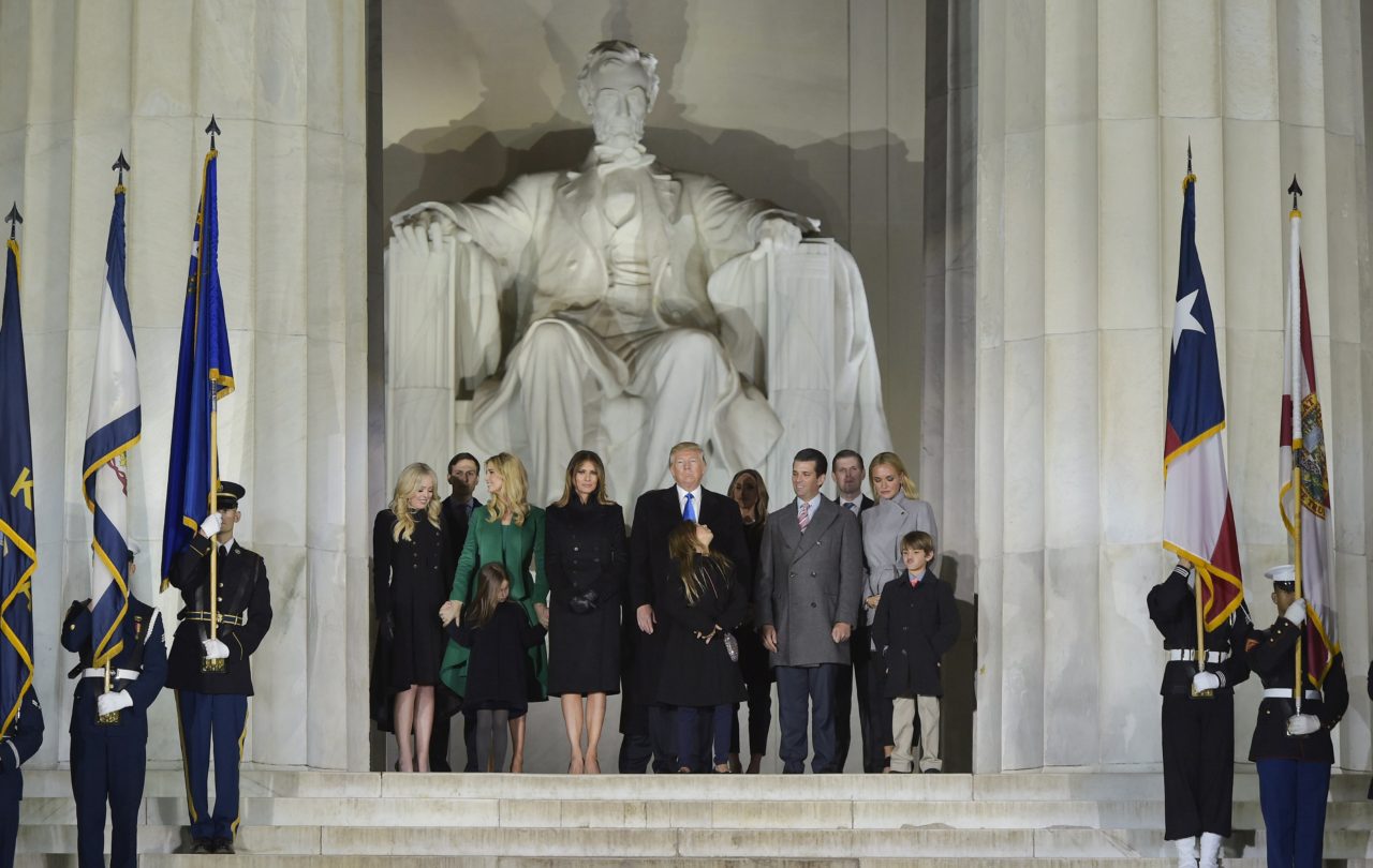 US President-elect Donald Trump and family pose at the end of a welcome celebration at the Lincoln Memorial in Washington, DC, on January 19, 2017. / AFP / MANDEL NGAN (Photo credit should read MANDEL NGAN/AFP/Getty Images)
