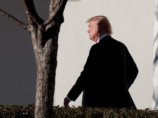 WASHINGTON, DC - JANUARY 26: Upon returning from Philadelphia, President Donald Trump walks along the West Wing Colonnade on his way to the Oval Office at the White House, January 26, 2017 in Washington, DC. President Trump traveled to Philadelphia for the Joint GOP Issues Conference. (Photo by Drew Angerer/Getty …