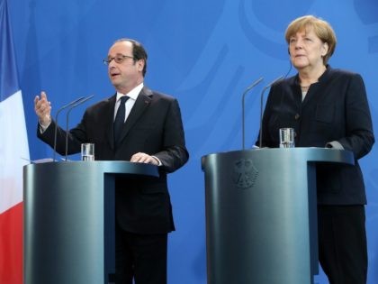German Chancellor Angela Merkel (R) and French President Francois Hollande