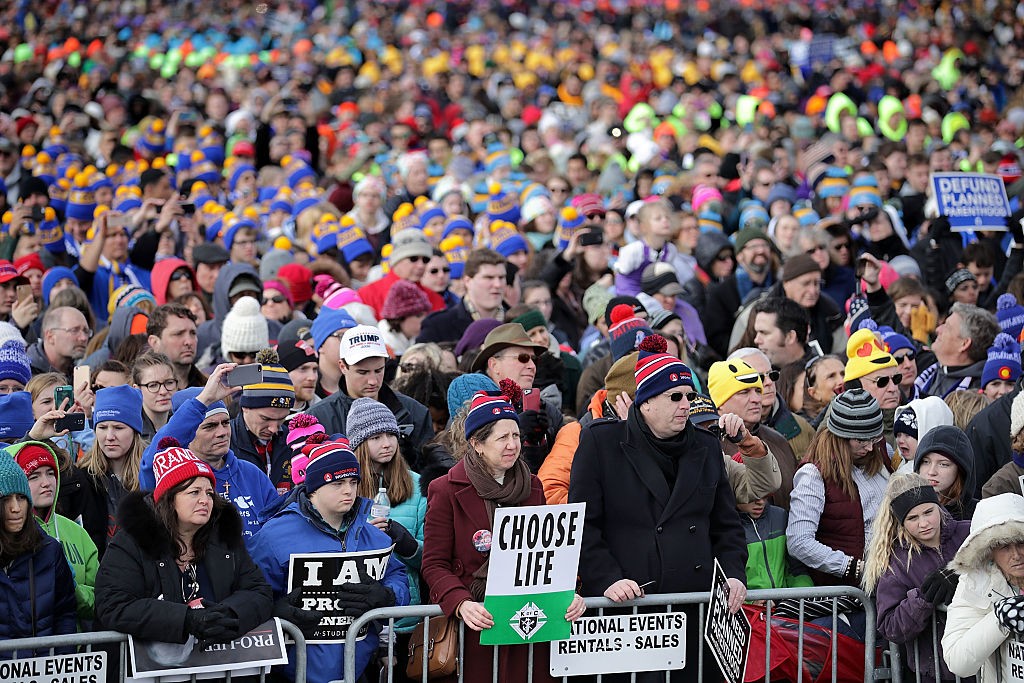 WASHINGTON, DC - JANUARY 27: Thousands of people rally on the National Mall before the start of the 44th annual March for Life January 27, 2017 in Washington, DC. The march is a gathering and protest against the United States Supreme Court's 1973 Roe v. Wade decision legalizing abortion. (Photo by Chip Somodevilla/Getty Images)