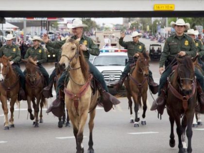 Border Patrol agents on horseback were invited to ride in the …