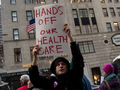 NEW YORK, NY - JANUARY 13: Health care activists rally down the street from Trump Tower to 'declare healthcare a human right,' near Trump Tower, January 13, 2017 in New York City. The annual National Single-Payer Strategy Conference will be taking place this weekend in New York. (Photo by Drew …