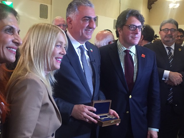 Reza Pahlavi (middle) receiving key to the city from former Beverly Hills Mayor John Mirisch (right) and former mayor Lili Bosse (left).