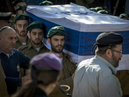 JERUSALEM, ISRAEL - JANUARY 09: The coffin of Shira Hajaj is carried during her funeral on January 9, 2017 in Jerusalem, Israel. Hajaj was one among the four soldiers killed during the truck attack the previous day. (Photo by Ilia Yefimovich/Getty Images)