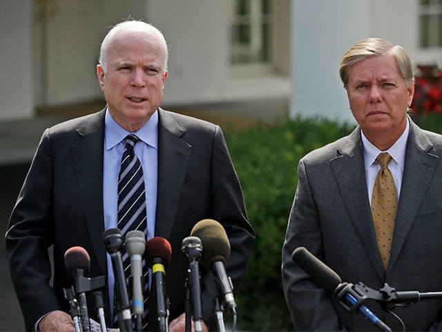 John-McCain-Lindsey-Graham-Sept-2013-AP