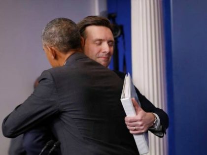 Obama Hugs Josh Earnest AP