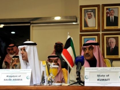 Kuwait's Foreign Minister Sabah Al-Sabah (R) and Saudi Foreign Minister Adel al-Jubei