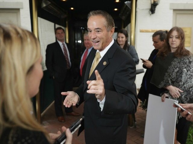 Rep. Chris Collins (R-NY) talks to reporters following a meeting with fellow members of Co