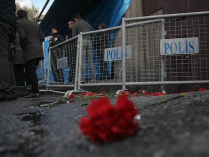 Flowers are placed outisde the Reina nightclub by the Bosphorus, following a gun attack on